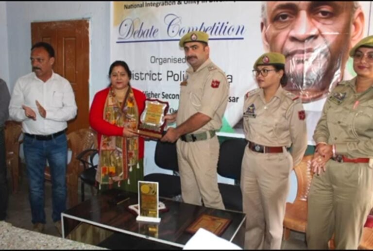 Students engaging in a debate competition at Government Higher Secondary School Assar
